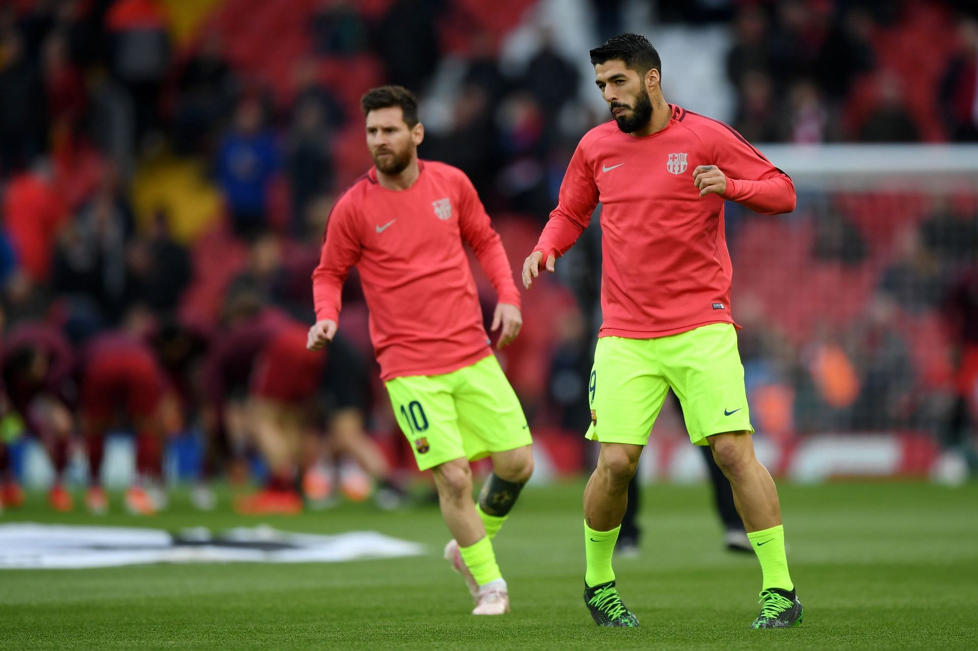 Lionel Messi and Luis Suarez (via Getty Images)